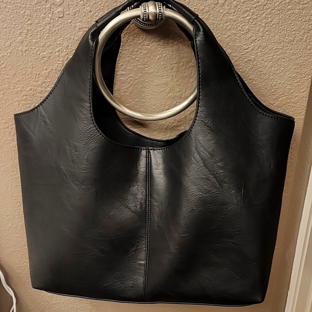 Ah-dorned faux leather hobo bag